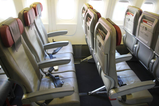 istock Passenger seats on the airplane, economy class 1129609411