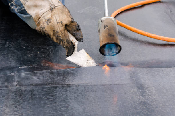 istock laying of waterproofing sheathing  and insulation on a roof 1129613276