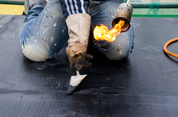 istock laying of waterproofing sheathing  and insulation on a roof 1129613285