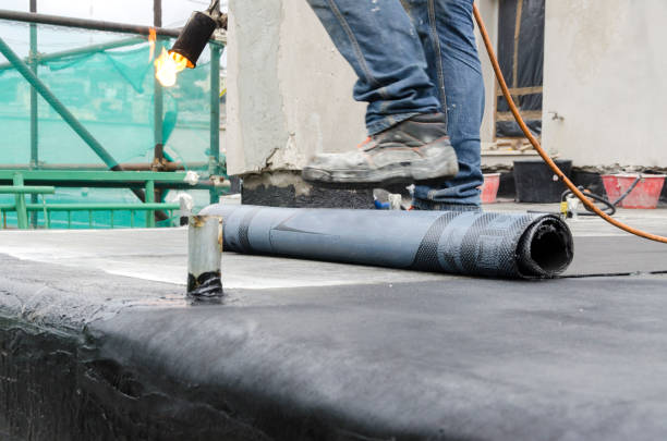istock laying of waterproofing sheathing  and insulation on a roof 1129613308