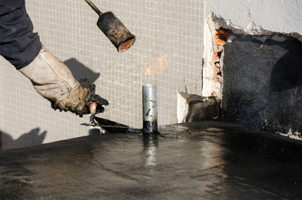 istock laying of waterproofing sheathing  and insulation on a roof 1129613338