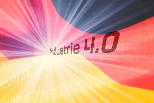 Flag of Germany and slogan Industry 4.0