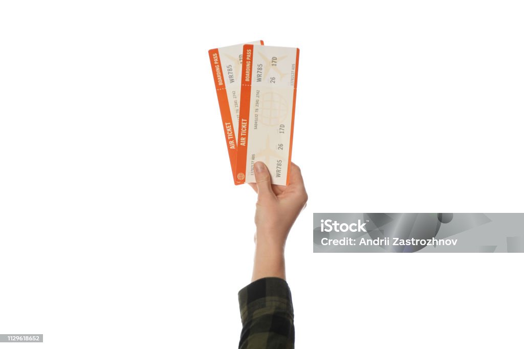 Air ticket in hand isolated on white background. Planning trip, summer vacation Air ticket in hand isolated on white background. Planning trip, summer vacation. Ticket Stock Photo