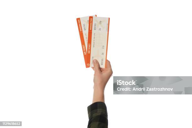 Air Ticket In Hand Isolated On White Background Planning Trip Summer Vacation Stock Photo - Download Image Now