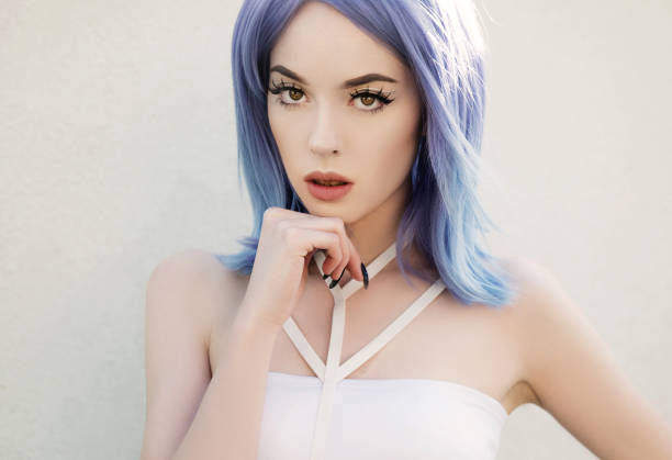 istock Young woman with blue hair 1129620040