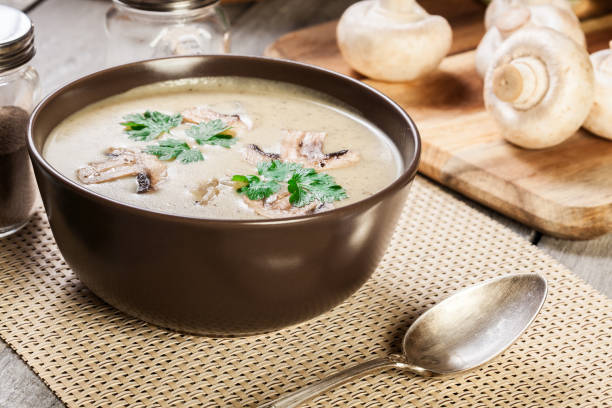 istock Mushroom cream soup with herbs and spices 1129620166