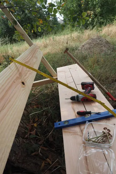 a wooden bench with tools