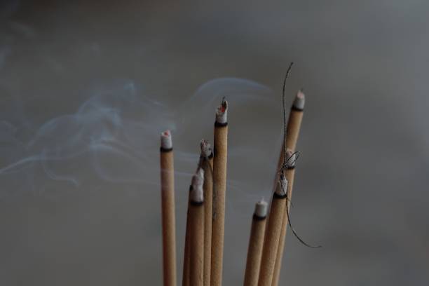 istock group of incense stick and smoke from incense burning 1129623696