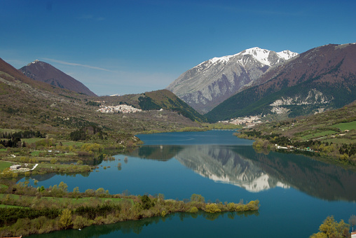 Lago di Barrea (Lake of Barrea) in the Abruzzo National Park, Italy, surrounded by mountains. Photo was taken from the village of Barrea, Province of L'Aquila, Italy
