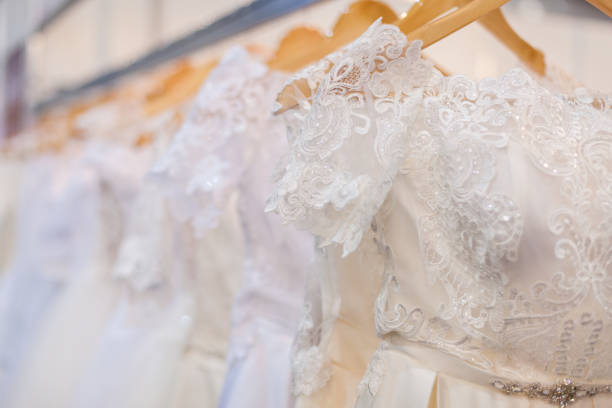 istock Wedding dresses in the bridal salon. 1129624316