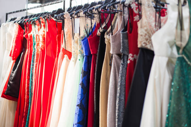 istock Stand with a colorful evening dresses. 1129624470