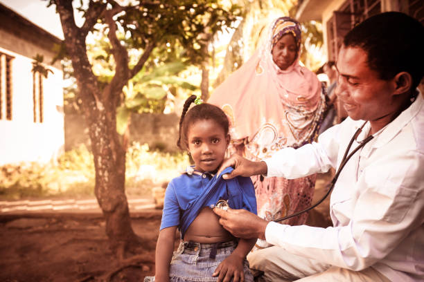 istock Doctor meet African child 1129628917