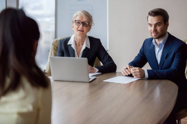istock Interested hr managers focused on listening applicant at job interview 1129629287