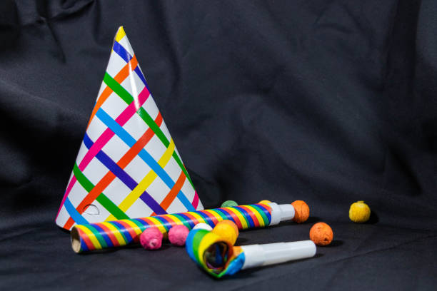 Cotillons, pointed clown hat, sepentins for partying at carnival, birthday or New Year's Eve Corso fleuri, birthday, New Year's Eve and Carnival anniversaire stock pictures, royalty-free photos & images