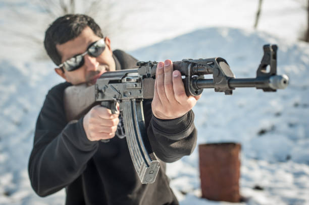istock Front view gun point riffle machine gun. Shooting and weapons 1129631696