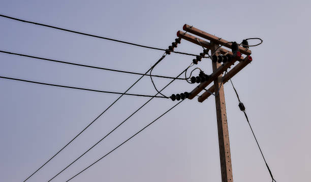 istock Electricity post with transmission power lines 1129631804