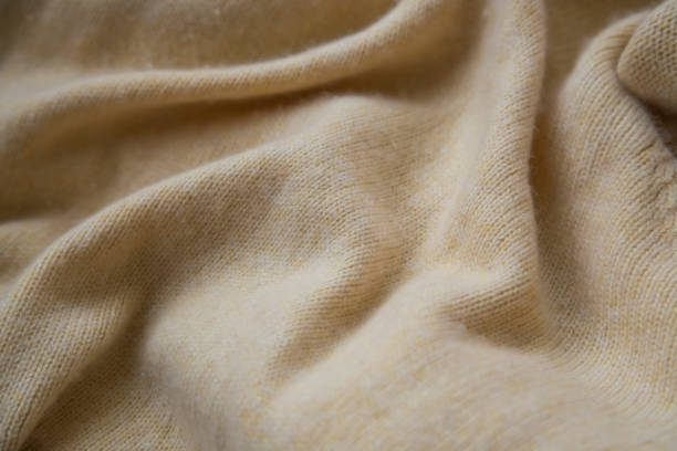 istock Soft cashmere texture, cosy warm cashmere sweater or blanket texture closeup 1129632333