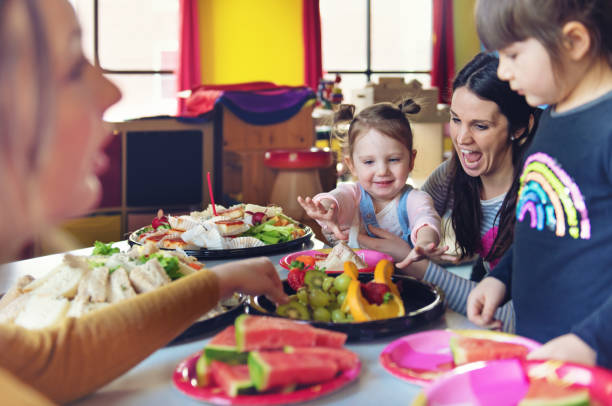 istock Children having lunch at the kindergarden 1129632627