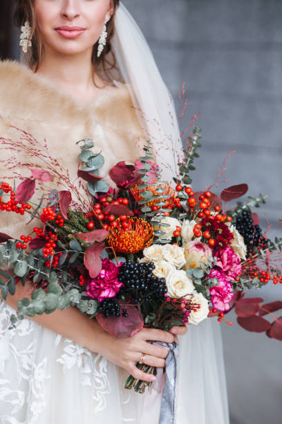 istock Wedding bouquet in bride's hands. Wedding day 1129634508