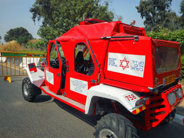 A new light extraction and evacuation vehicle for Israeli MDA Rishon LeTsiyon, Israel-May 3, 2013: Magen David Adom (Red Star of David) donated a vehicle for evacuation and extraction at bad environmental conditions. The donation comes from the Australian family of Fleiszig. ambulance in israel stock pictures, royalty-free photos & images