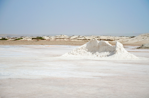 The salt lake water is dried and the salt has been gathered, ready to be bagged and shipped to the refinery.\n\nSal, means \