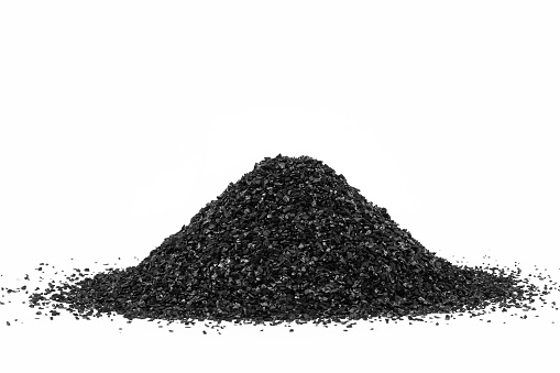 Activated Carbon in the water filter isolated on white background. Activated Carbon.