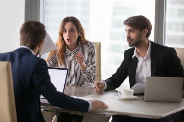 istock Disgruntled workers or angry clients customers arguing about bad contract 1129638574