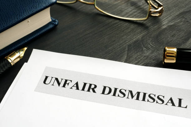 istock Unfair dismissal documents and pen in an office. 1129640376