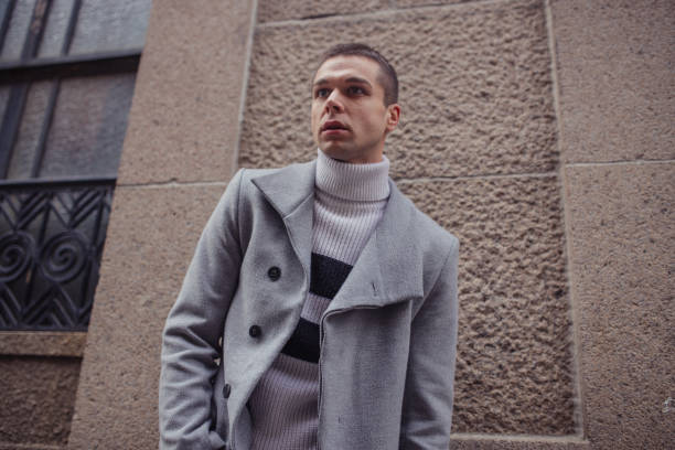 istock Young man in winter clothing 1129641998