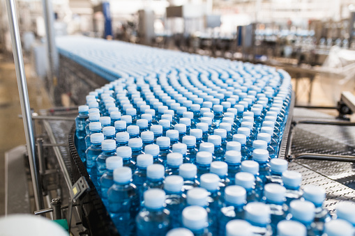 Bottling plant - Water bottling line for processing and bottling carbonated water into bottles.