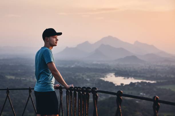 istock Man contemplation at the sunset 1129645324