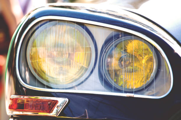 istock headlight and beautiful retro car design, retro toned 1129645481