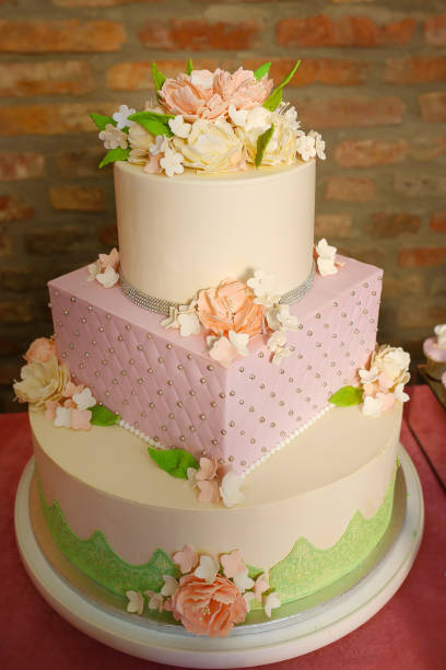 istock Different shape three tiered cake for formal events, weddings or birthday parties 1129645680