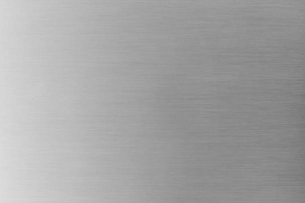 istock Brushed metal texture or brushed aluminium background 1129646598