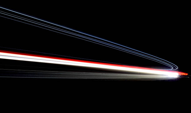 istock lights of cars with night 1129648608