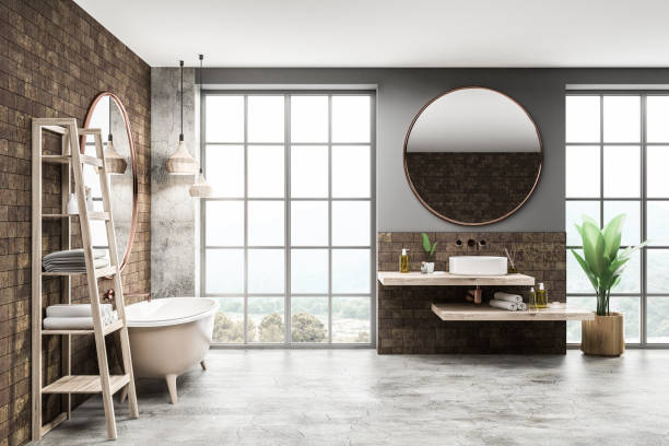 istock Loft brick bathroom, tub and sink 1129650040