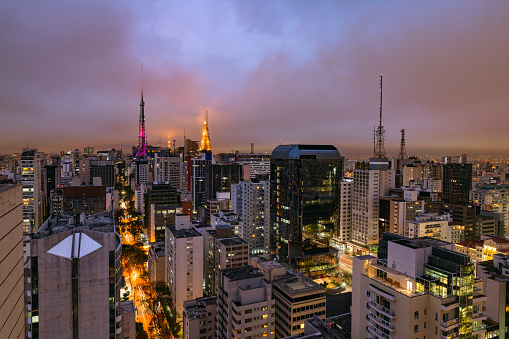 Office buildings, skyscrapers and antenna in futuristic urban Sao Paulo