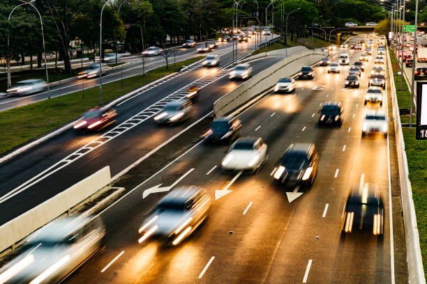 istock Blurred car traffic at dusk on modern highway 1129650774
