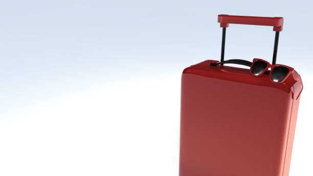 istock Red suitcase with sun glasses for traveller background 3D render 1129651408
