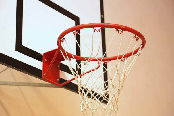 istock Basketball hoop in a sportshall. 1129652622