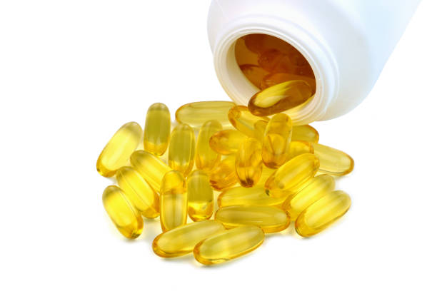 istock Fish oil capsules, omega-3 1129655811