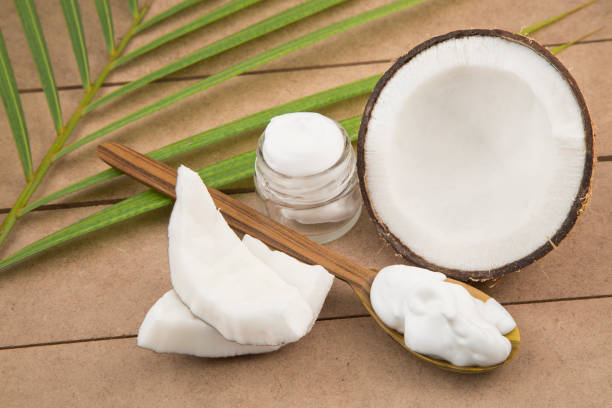 istock organic cosmetics with coconut on wooden background 1129659274