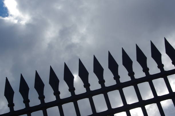 istock Fence iron, metal fence 1129661580