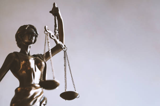 istock lady justice or justitia figurine - law and jurisprudence symbol 1129663248