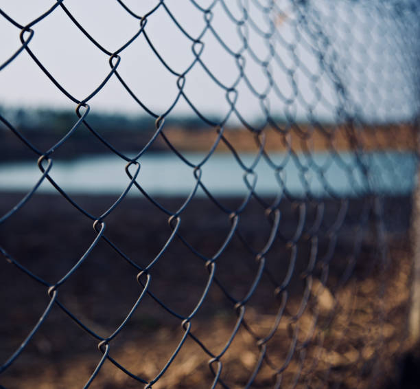 istock A metallic protection fence isolated object unique photo 1129663689