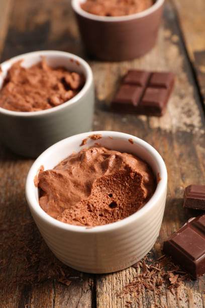 istock chocolate mousse on wood background 1129663750