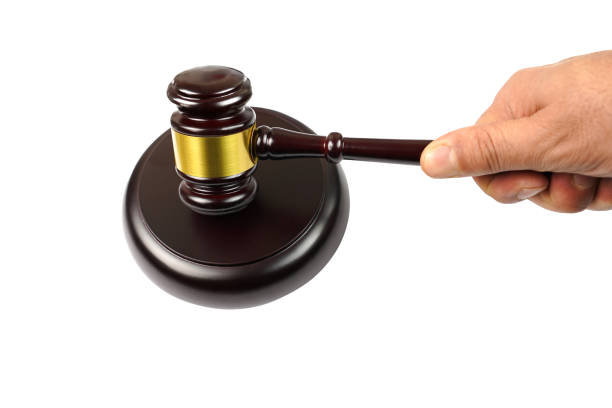 istock Wooden judgement or auction mallet. 1129663844