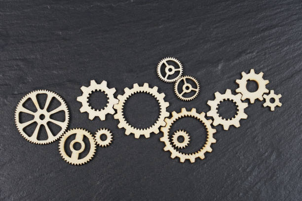 istock Gears on black background. Conceptual image of industry, mecanics, connection or team work. 1129664481