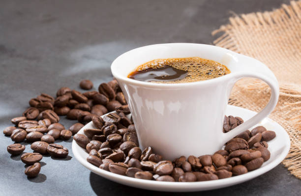 istock Coffee drink with grains on the table - Coffea 1129666348