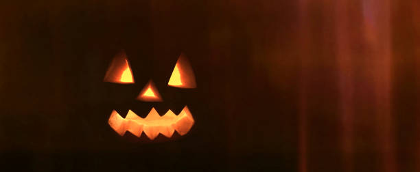 istock Halloween pumpkin with scary face 1129667445